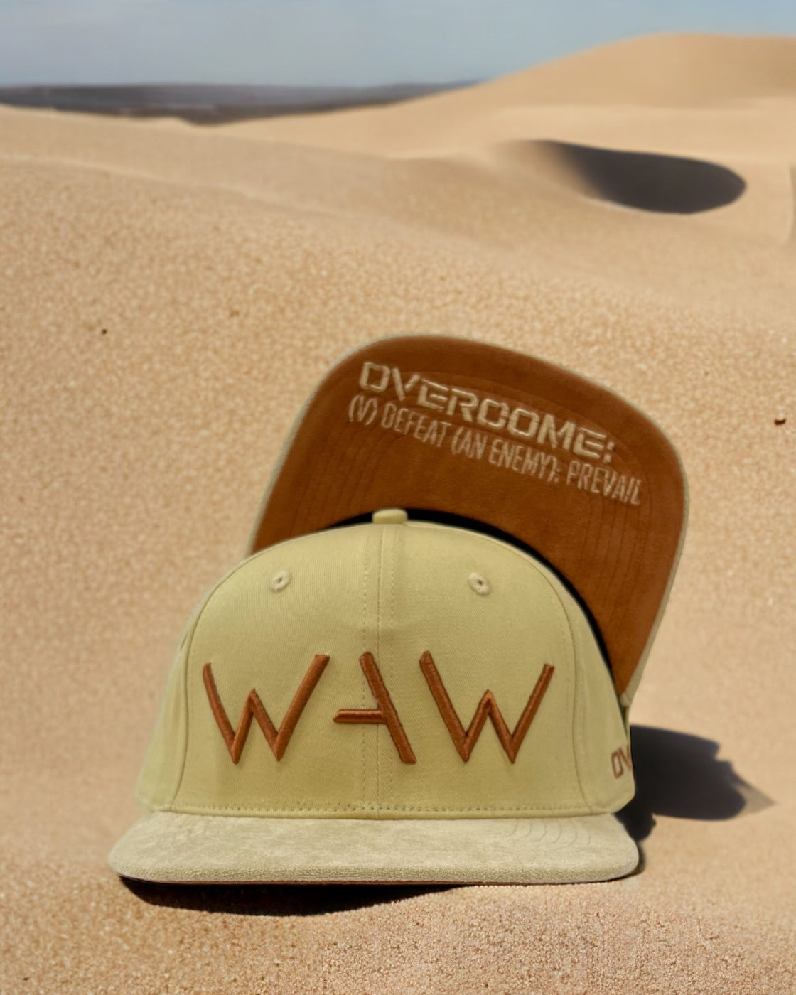 Sandstorm WAW Flatbill Hat, WAW logo and Overcome message, WeAreWarriorsApparel.com